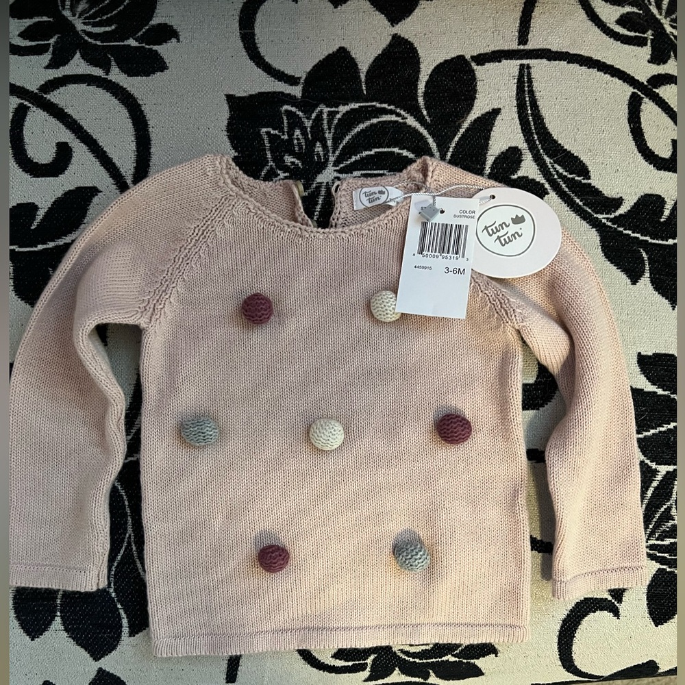 3-6 month pink sweater with Pom Poms.